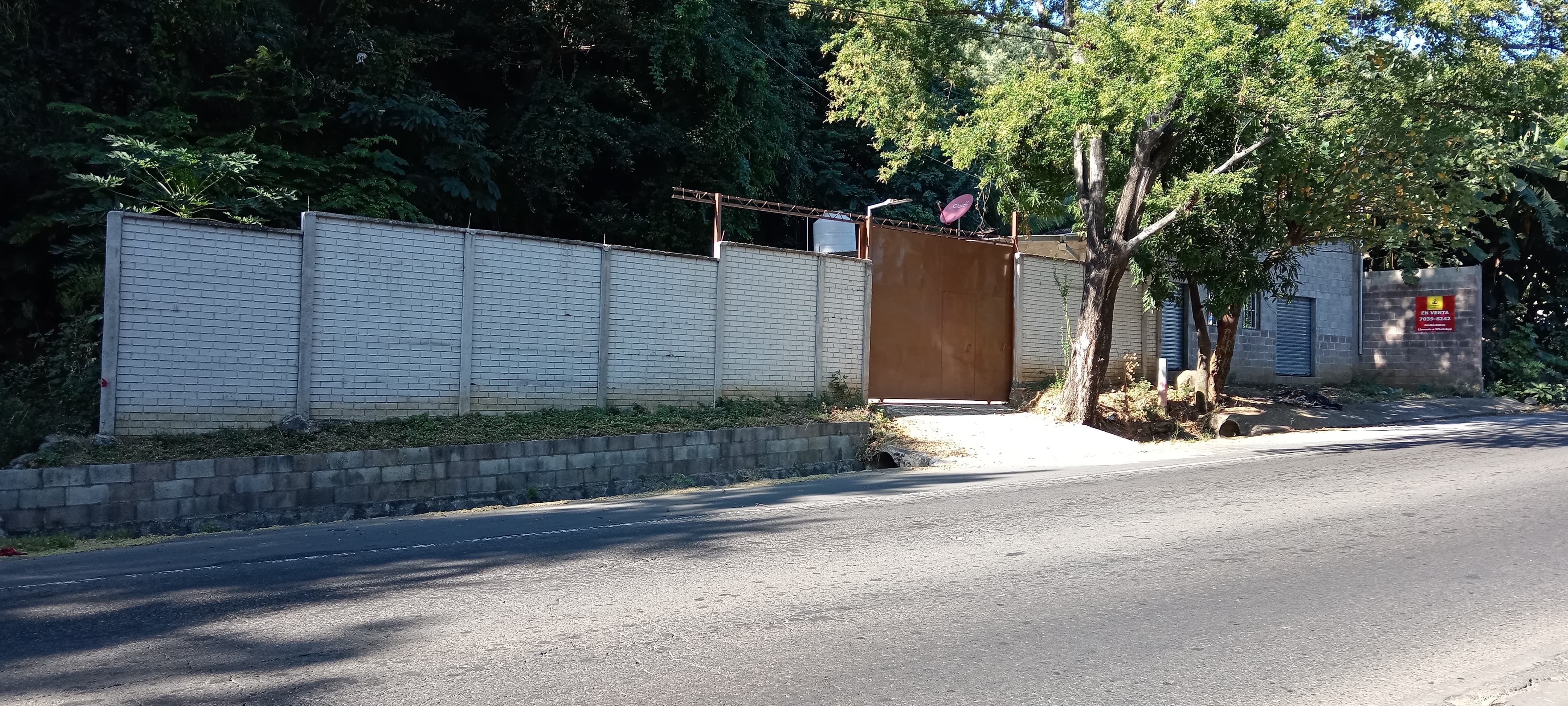 Land with house on Panamerican Highway, Canton San Sebastian, San Miguel