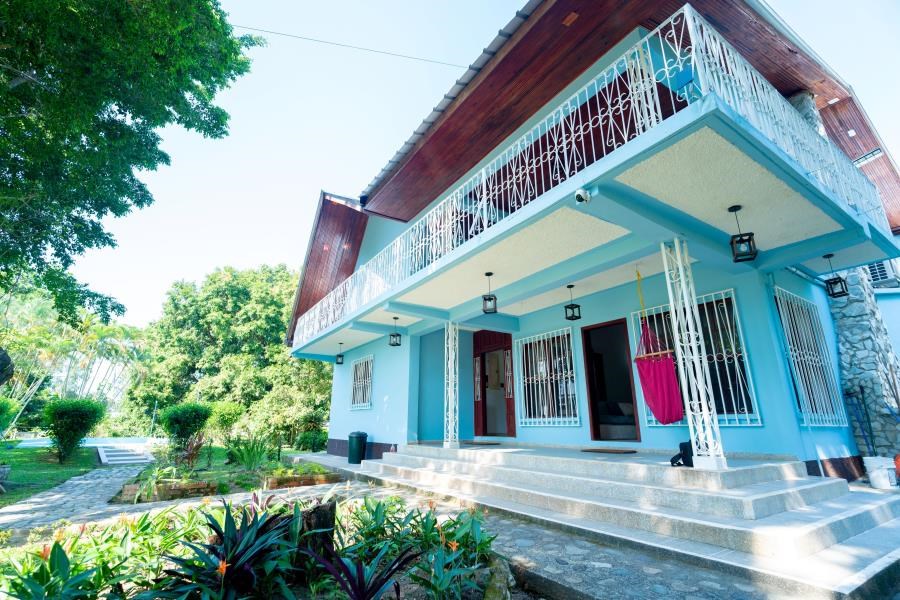 Remax real estate, Honduras, La Ceiba, "Blue moon house Steps from the Beach in La Ceiba, Honduras."