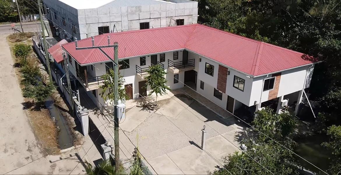 Remax real estate, Belize, Maya Beach, Large Retail Building with Grocery Store and 6 Apartments