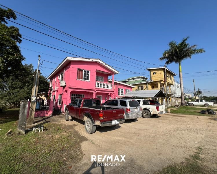 Centrally Located Gem: Spacious Property with Two-Story House and Apartment in Belmopan