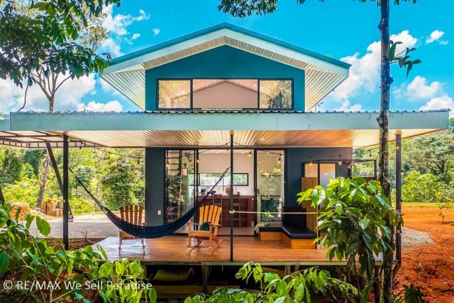 A 1-bedroom home PERFECT for a couple or an Airbnb rental – plus a HUGE jungle backyard with a year-round river and many magical swim holes